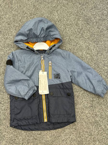 Вітровка з кишенями на кнопках Windbreaker with button pockets фото