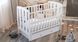 Детская кроватка для новорожденных ДУБОК Шарик SH-02 маятник, откидной бок бук белый 625942 фото
