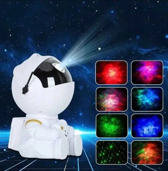 Проектор зоряного неба. Світильник Астронавт сидячий Mini з пультом Astronavt sidyachiy Mini фото